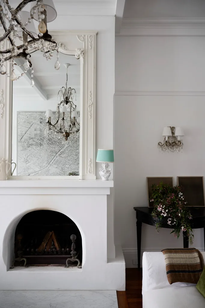A curved white fireplace