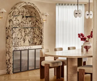 Neutral marble arch in dining room