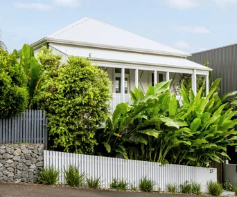 Facade of weatherboard Queenslander home