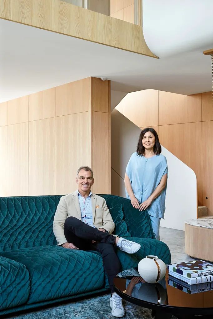 Jason Spear and Swee Lim in a modern lounge area