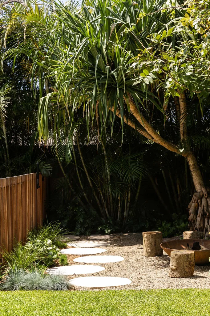 A fire pit area with stepping stones