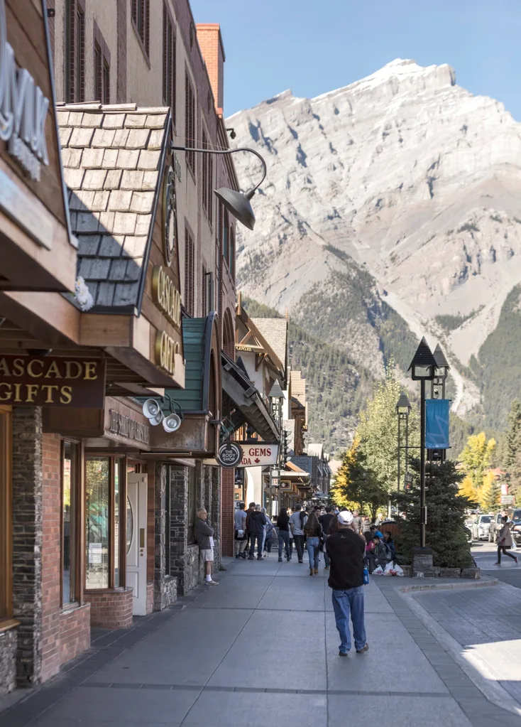 Town street with steep mountain behind