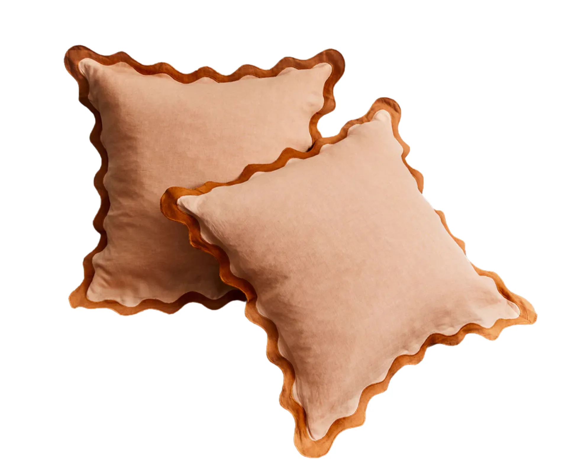 Terracotta coloured scalloped cushions