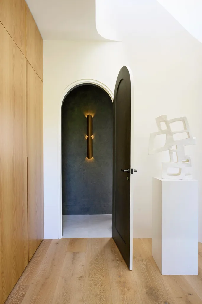A curved doorway in a renovated Federation home