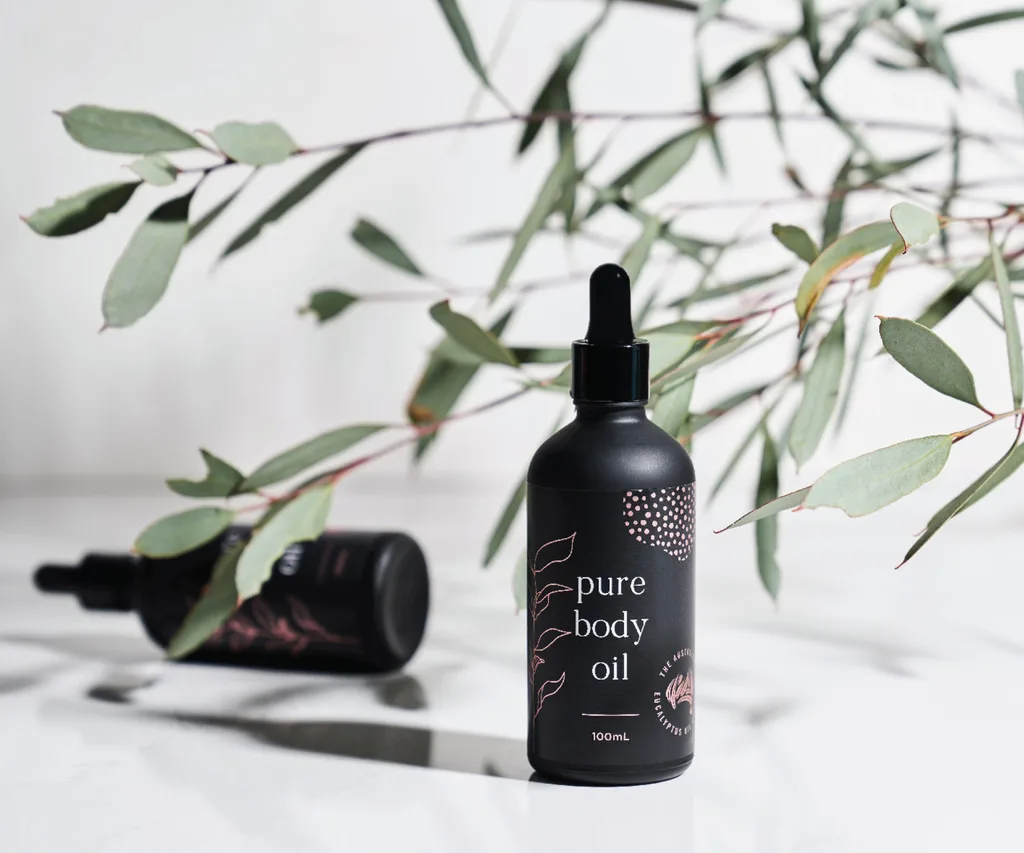 oil bottles and eucalyptus branch tree
