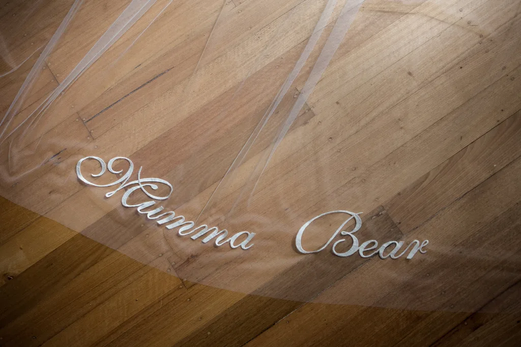 A train embroidered withe the words 'Mumma Bear'