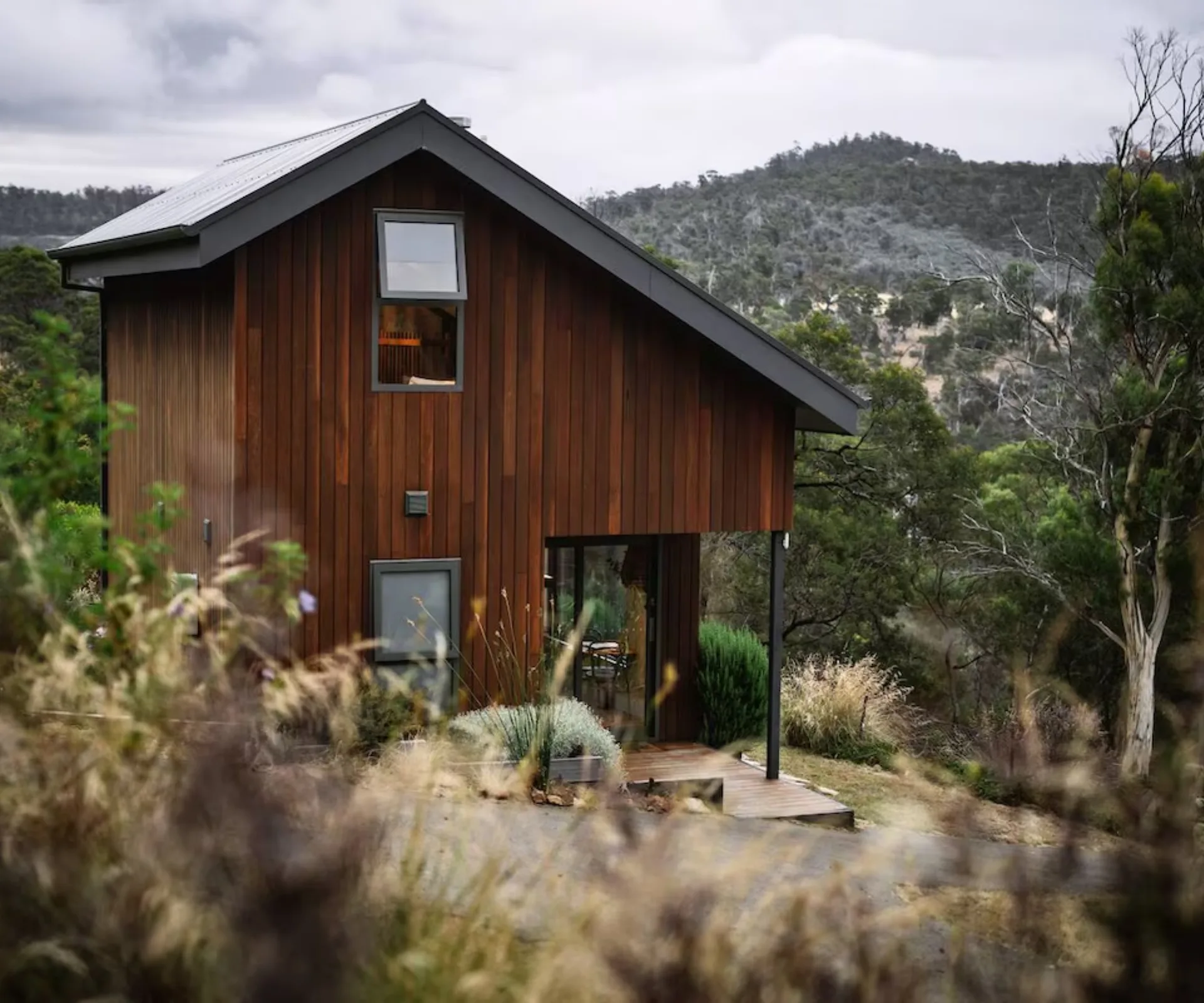 A modern home surrounded by bushland in Tasmania