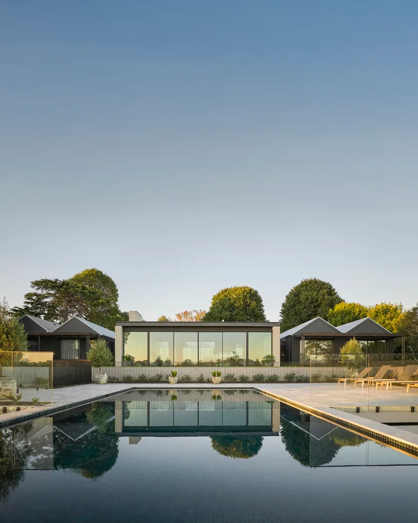 An outdoor entertaining area with a sleek pool.