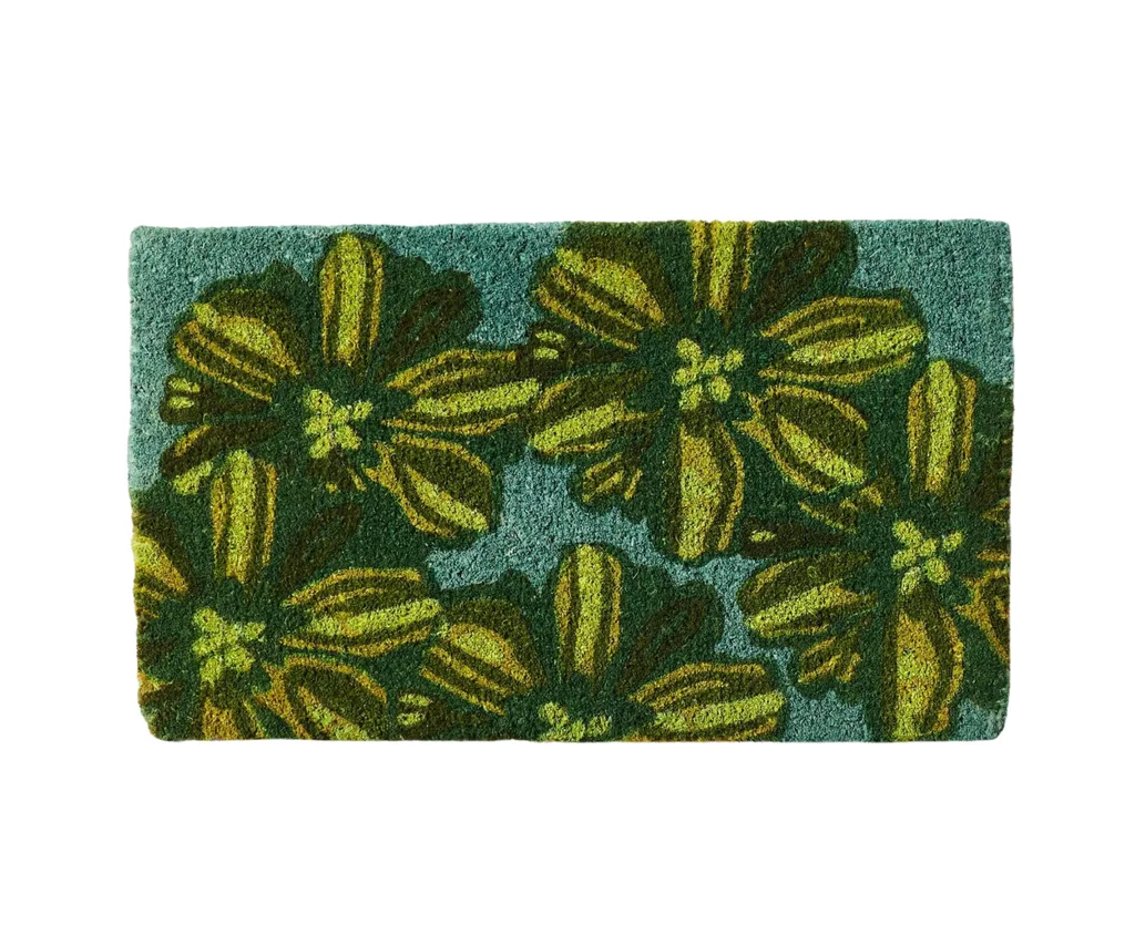 A Bonnie and Neil doormat with a botanical print