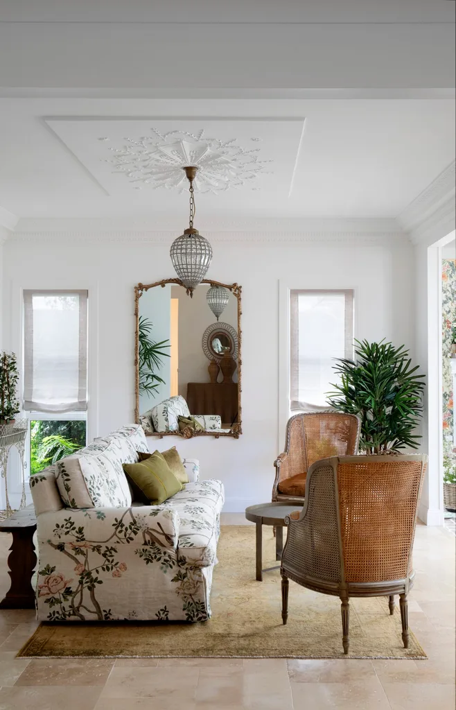 Mt Tamborine living room with antique furniture and a gold mirror