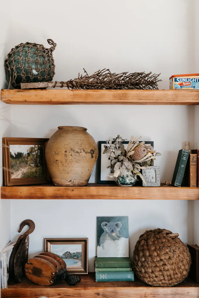 A shelf full of nautical-inspired trinkets
