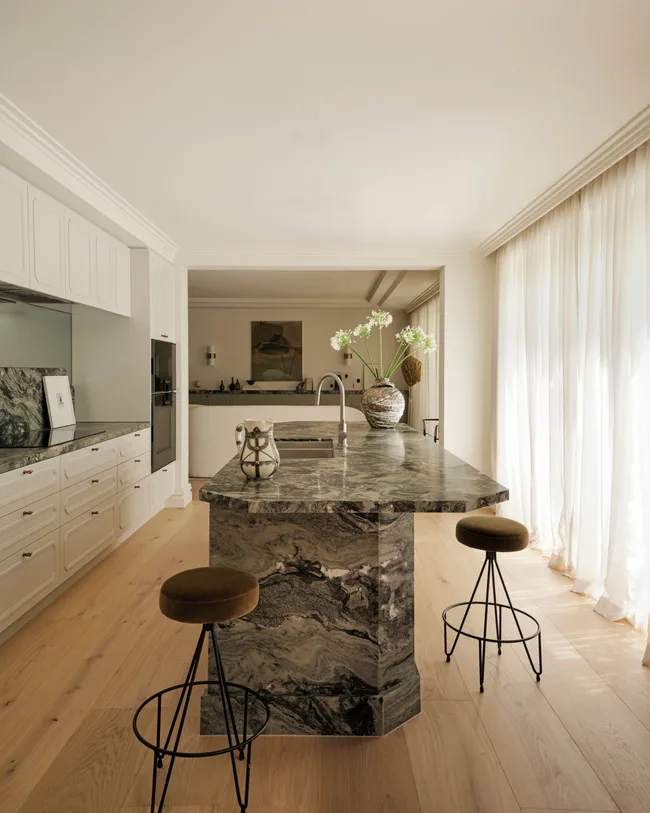 A marble benchtop in a small kitchen
