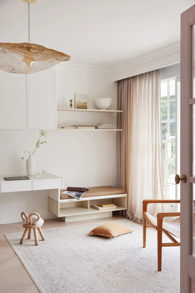 White, neutral home office/study with beige linen curtains.