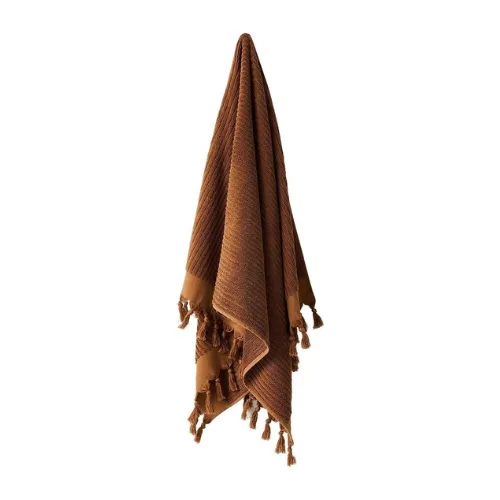 A brown bath towel