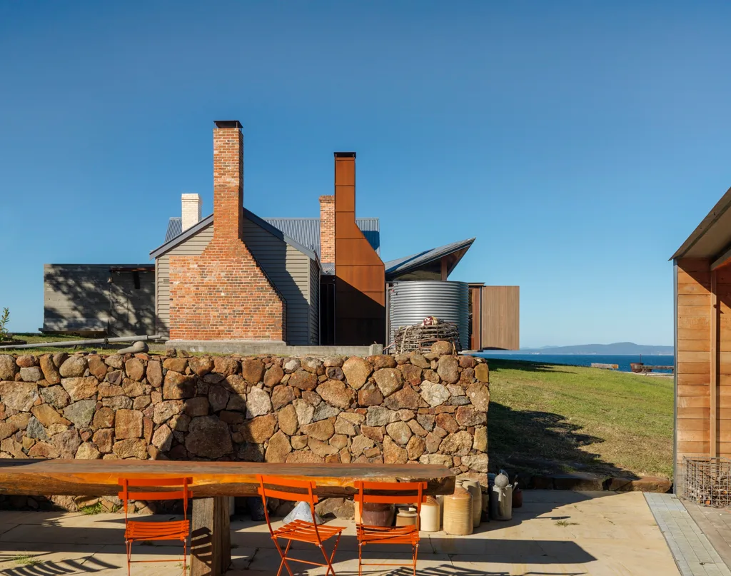 An alfresco dining area outside the renovated Captain Kelly's Cottage