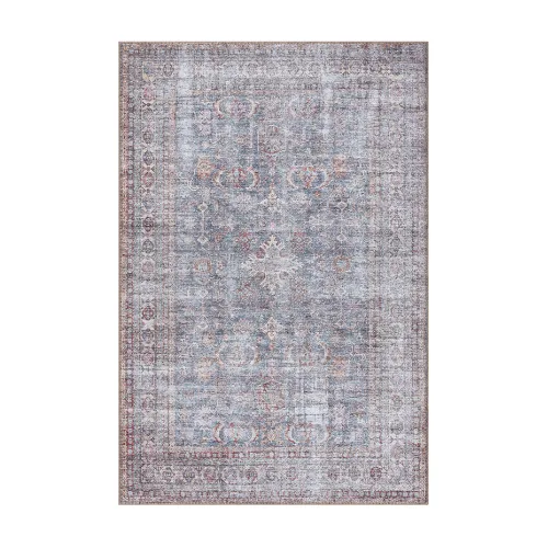 A faded Persian-style rug