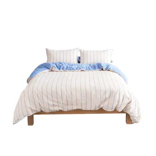 Striped blue and white bedding from Hommey