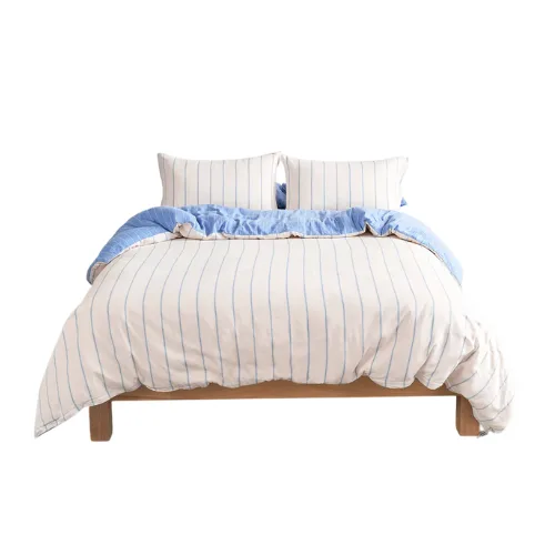 A blue and white striped bedding set
