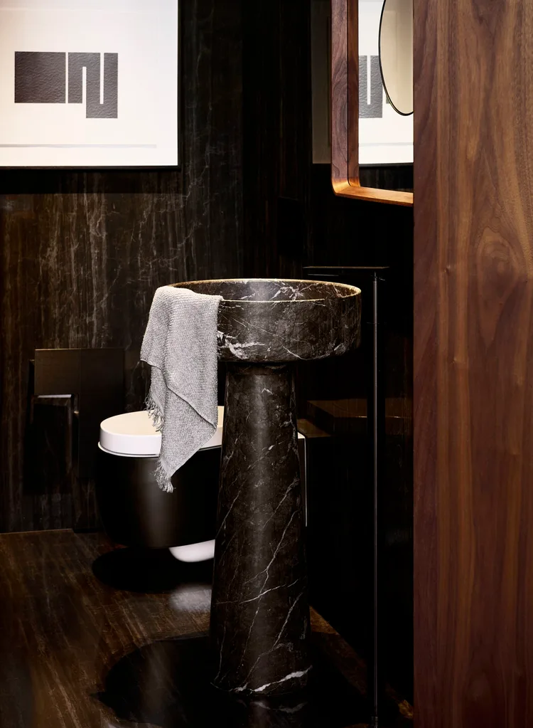 A statement stone pedestal sink