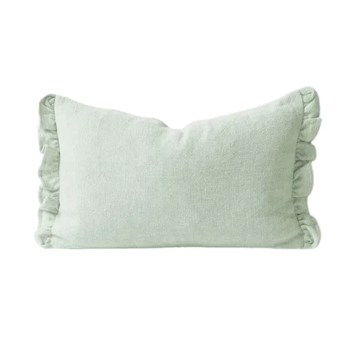 A blue ruffle cushion