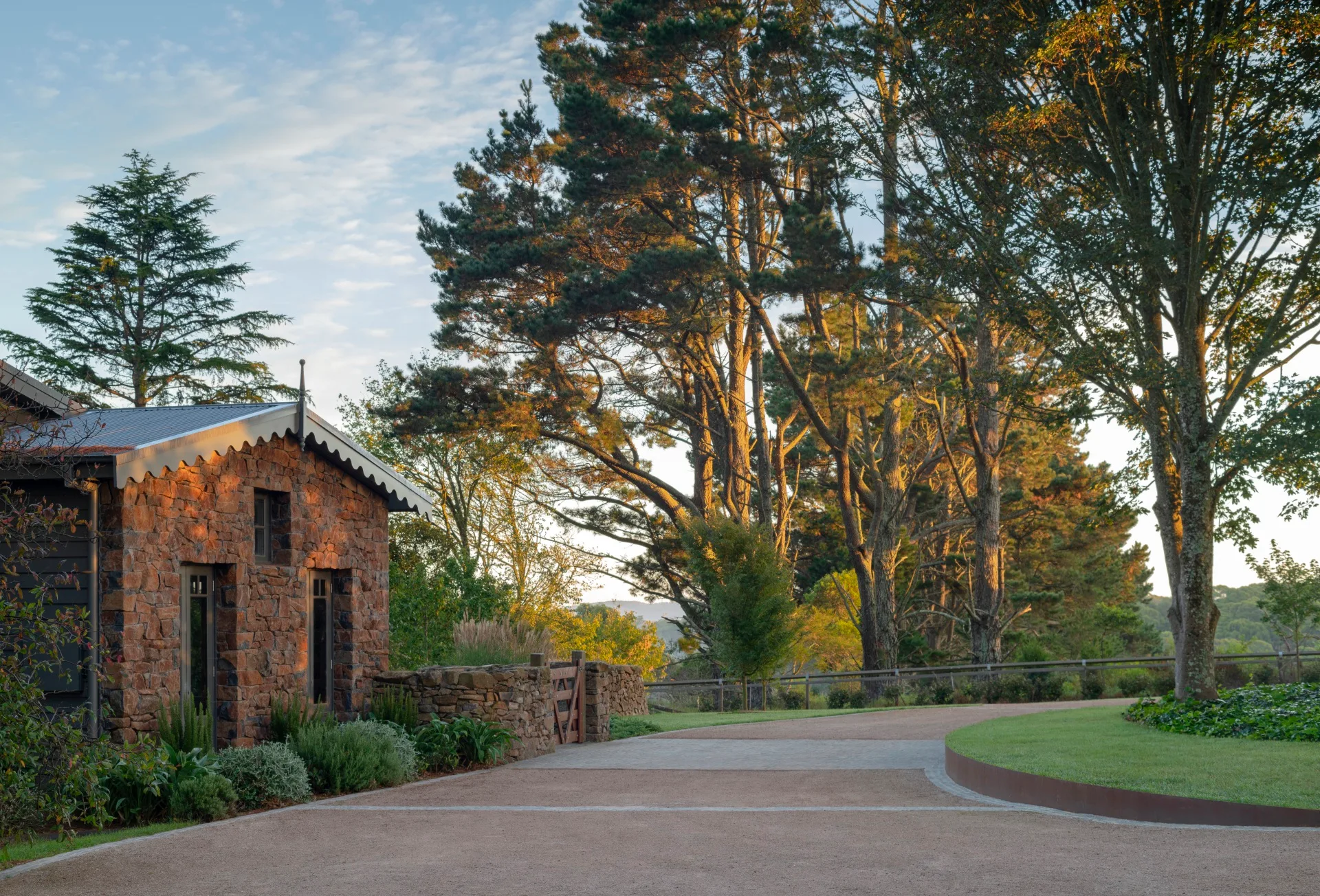 A country home surrounded by mature pine trees