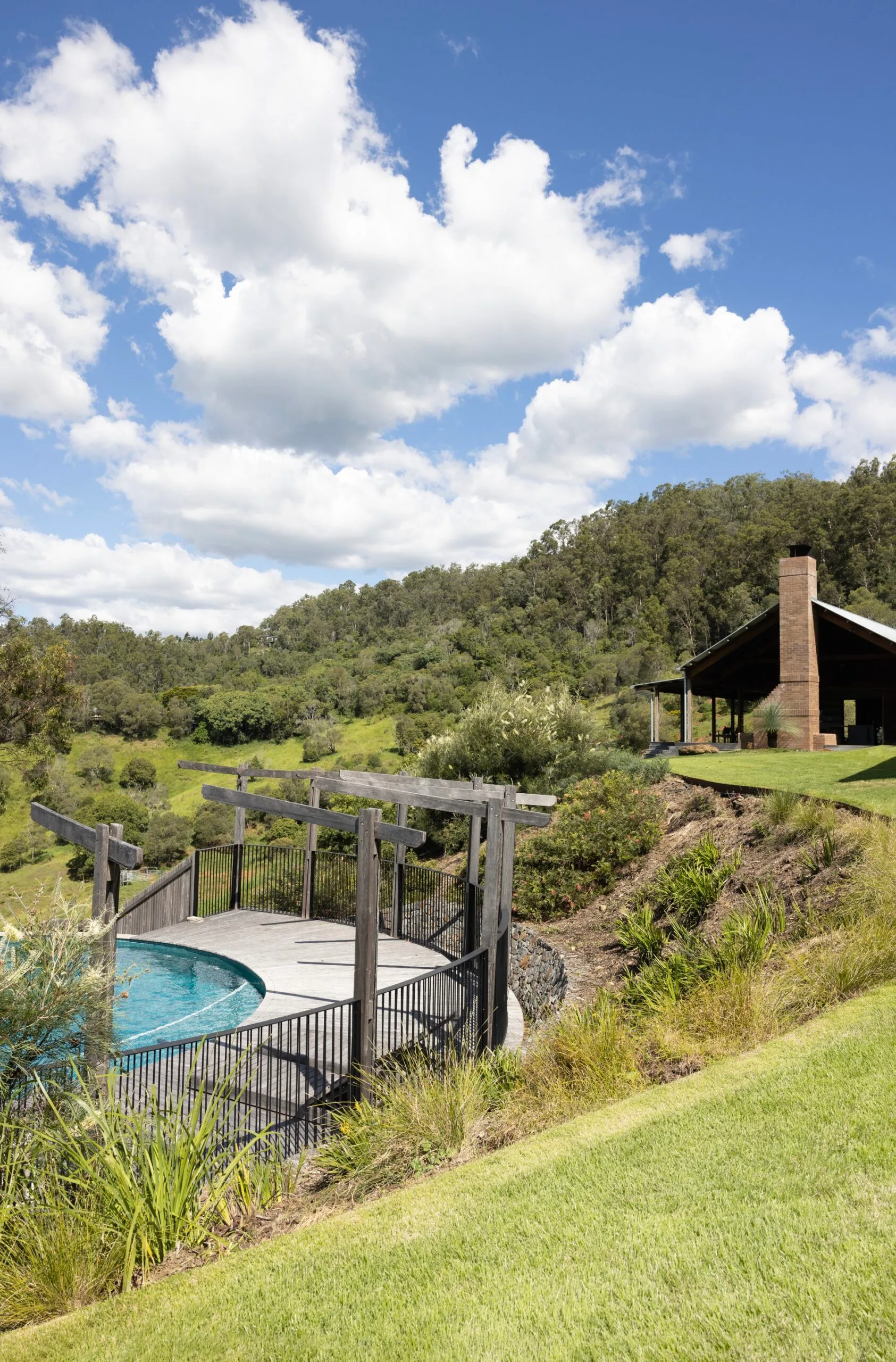 An outdoor pool in a country setting