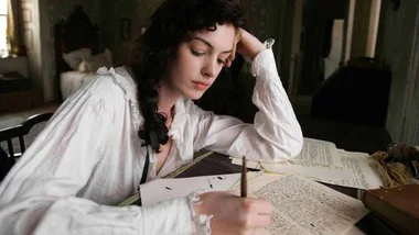 Anna Hathaway as Jane Austen writing