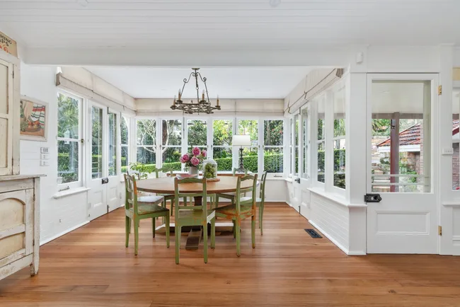 A dining area with timber floors