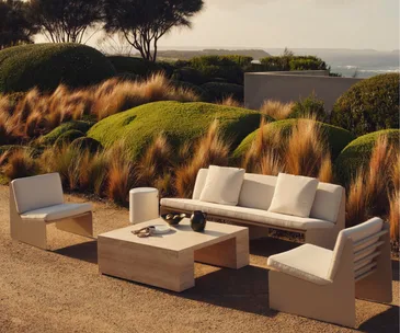 A white outdoor lounge setting by MCM House