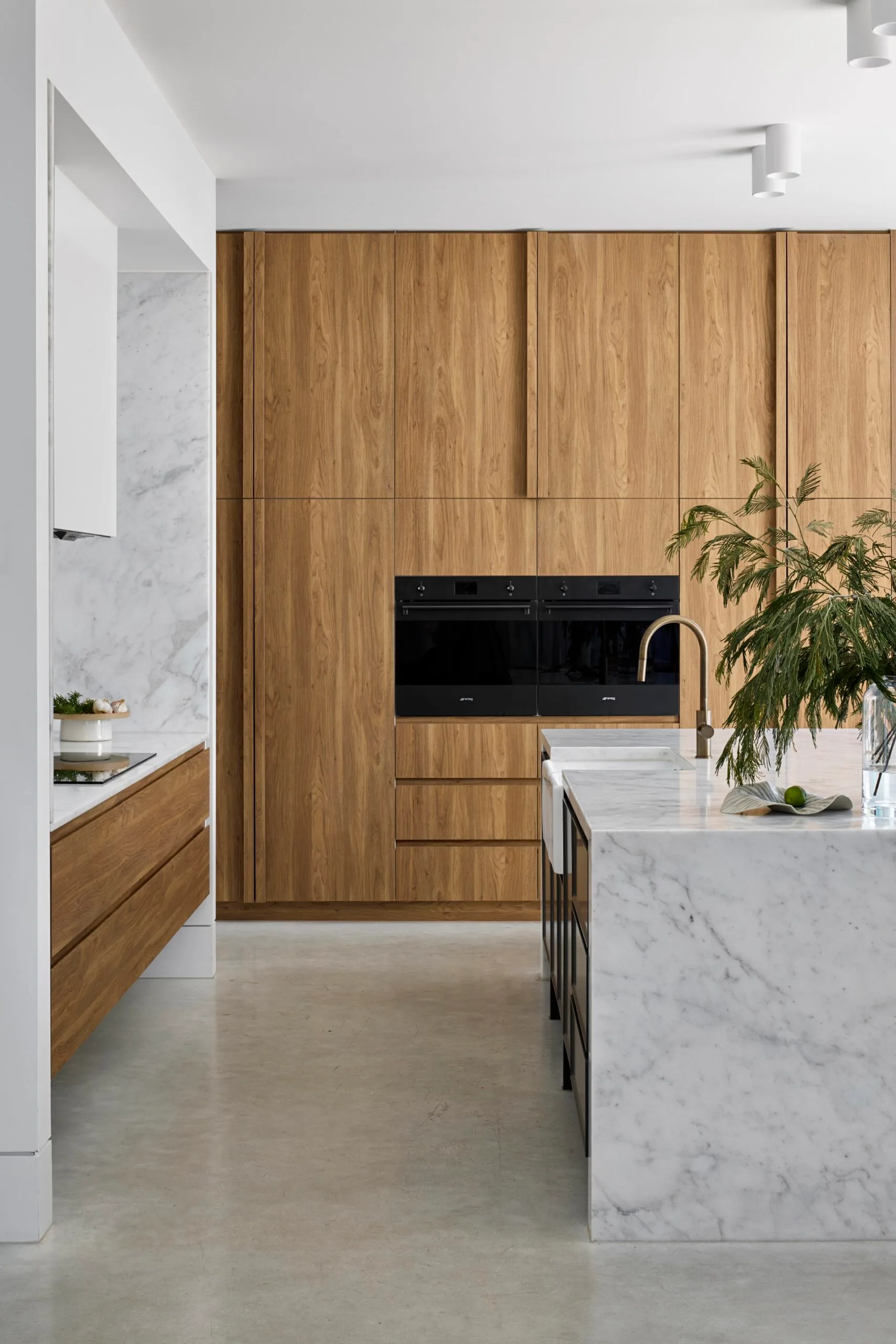 Modern kitchen with timber concrete and marble
