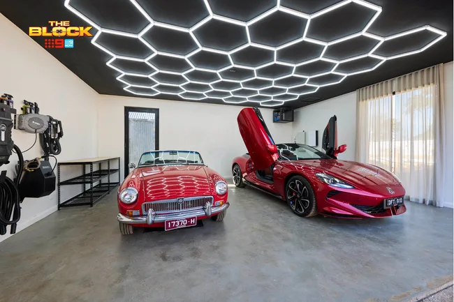 Robby and Mat's Block garage with luxury cars and hexagonal lighting
