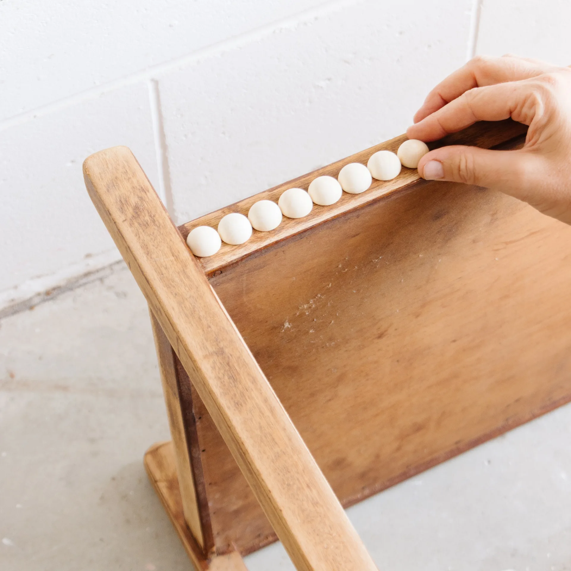 Embellishing a DIY bar cart