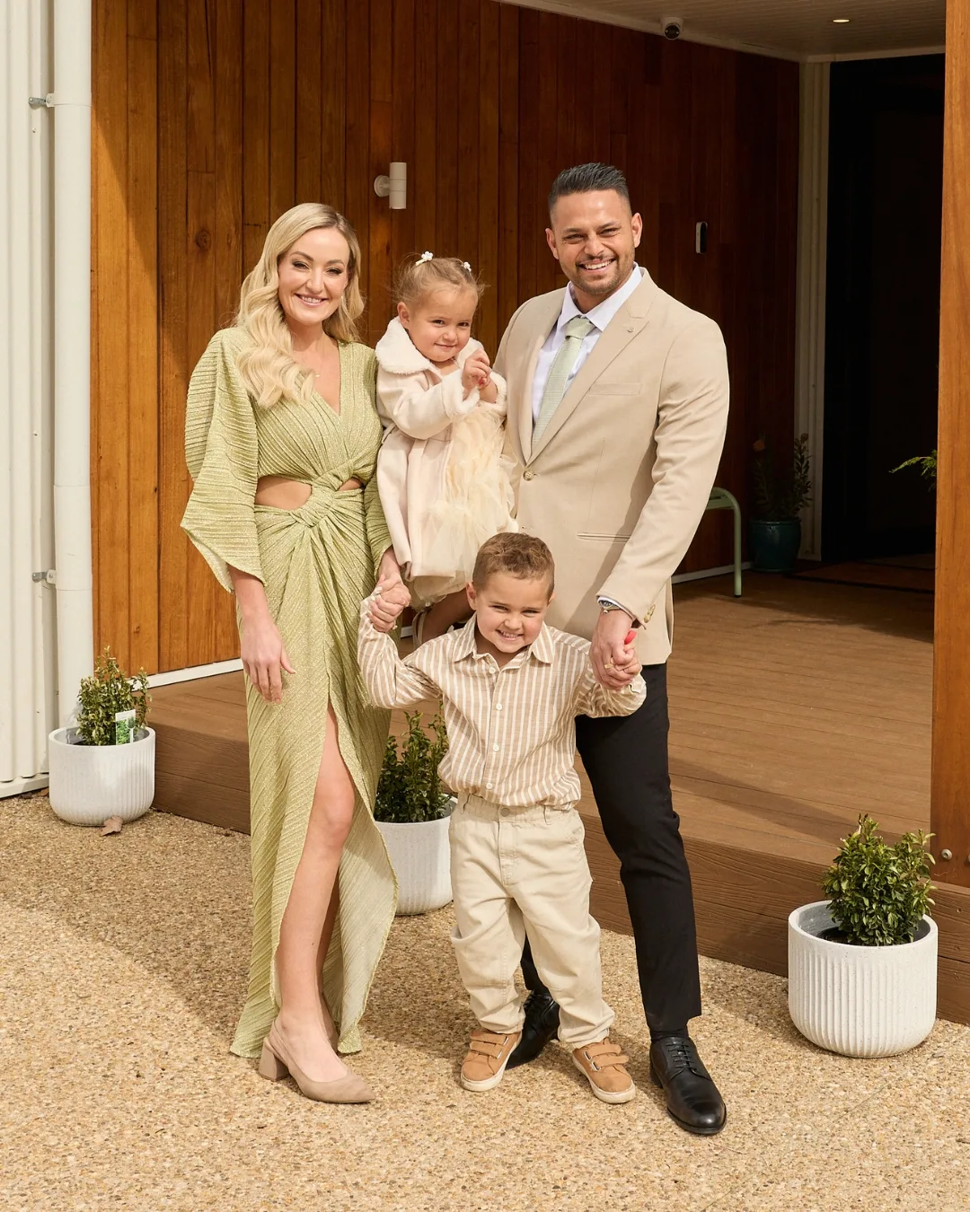 Britt and Taz with their two young children on The Block 2025 auction (1)