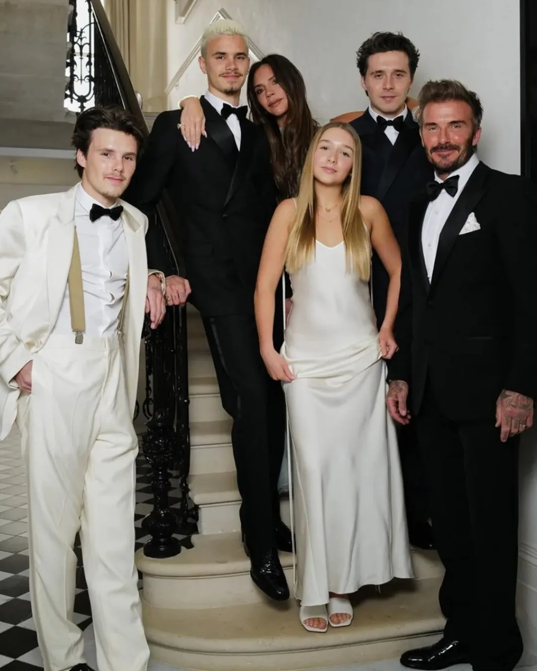 David and Victoria Beckham pose with their four children to celebrate his 50th birthday