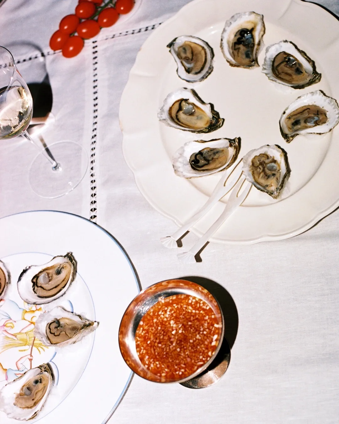 Tablescape with oysters, dining plates and more hosting essentials