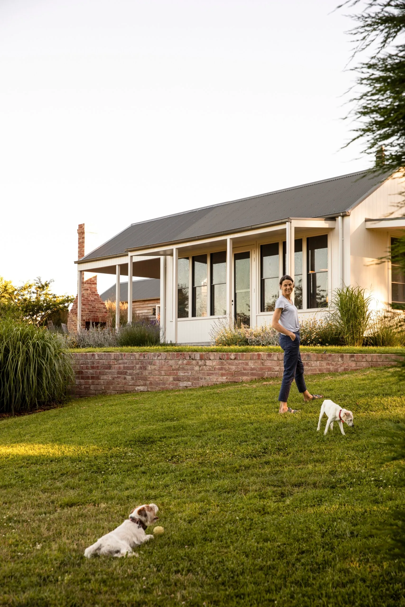 Pip playing with her two dogs, Indi and Tonka