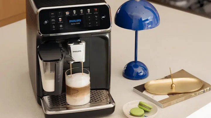 The Philips Series 5500 LatteGo automatic coffee machine styled on a benchtop