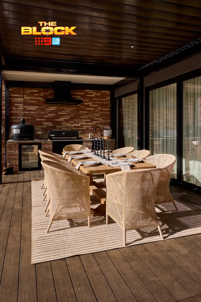 Sonny and Alicia's terrace with a brick feature wall