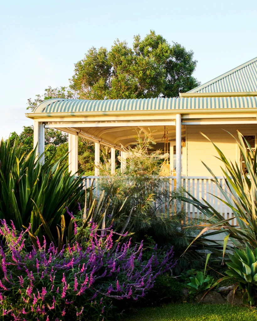 Byron View Farm, a cottage surrounded by gardens