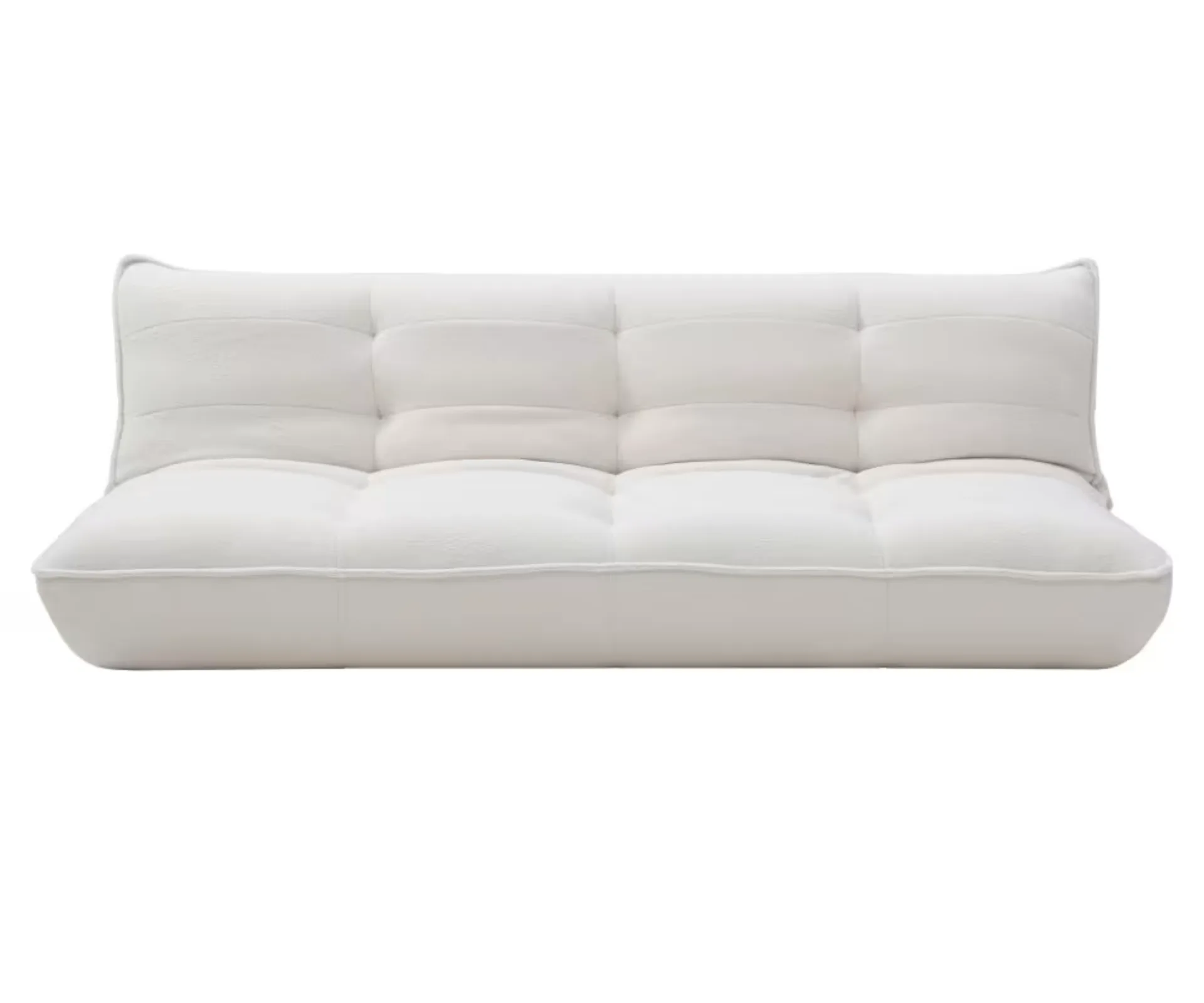A white boucle slouch couch 