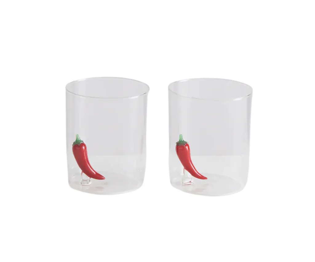 Two glasses with a little chilli in them