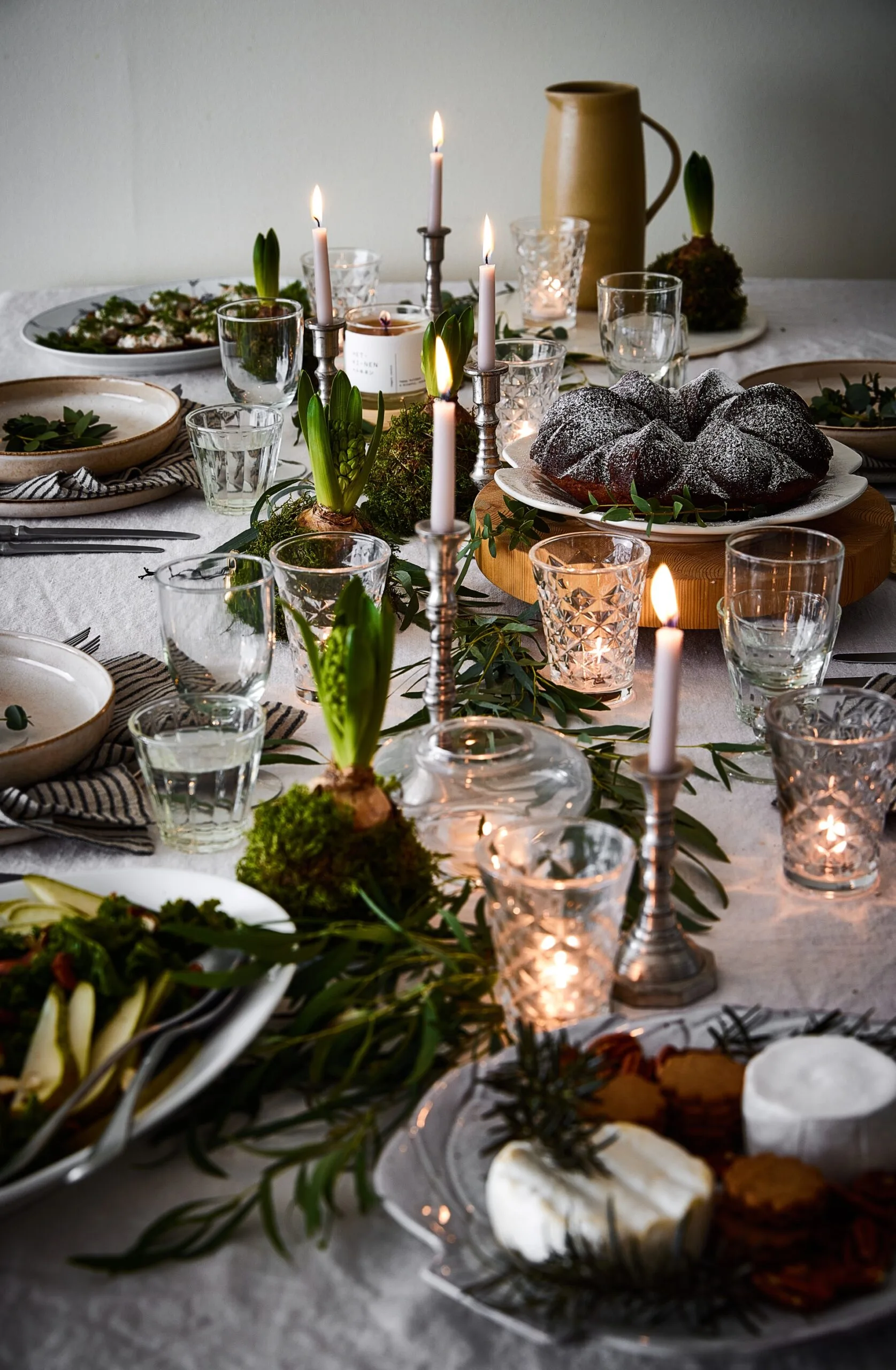 A festive tablescape with tapered candles