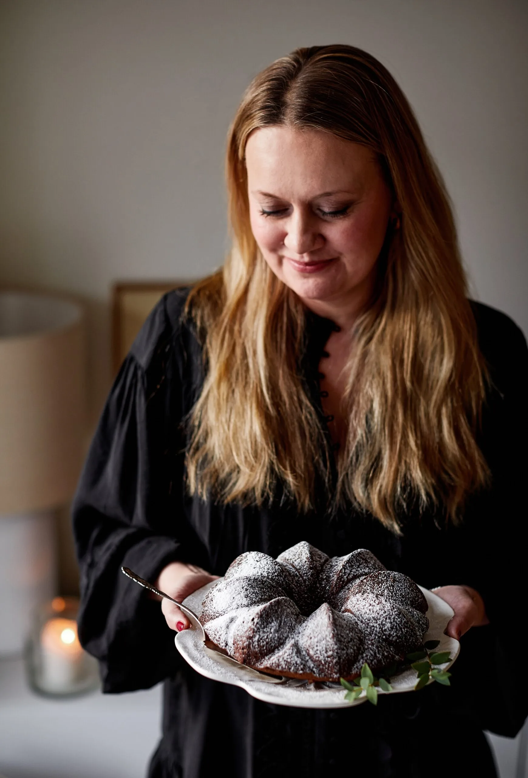 Sanna holding a Christmas dessert