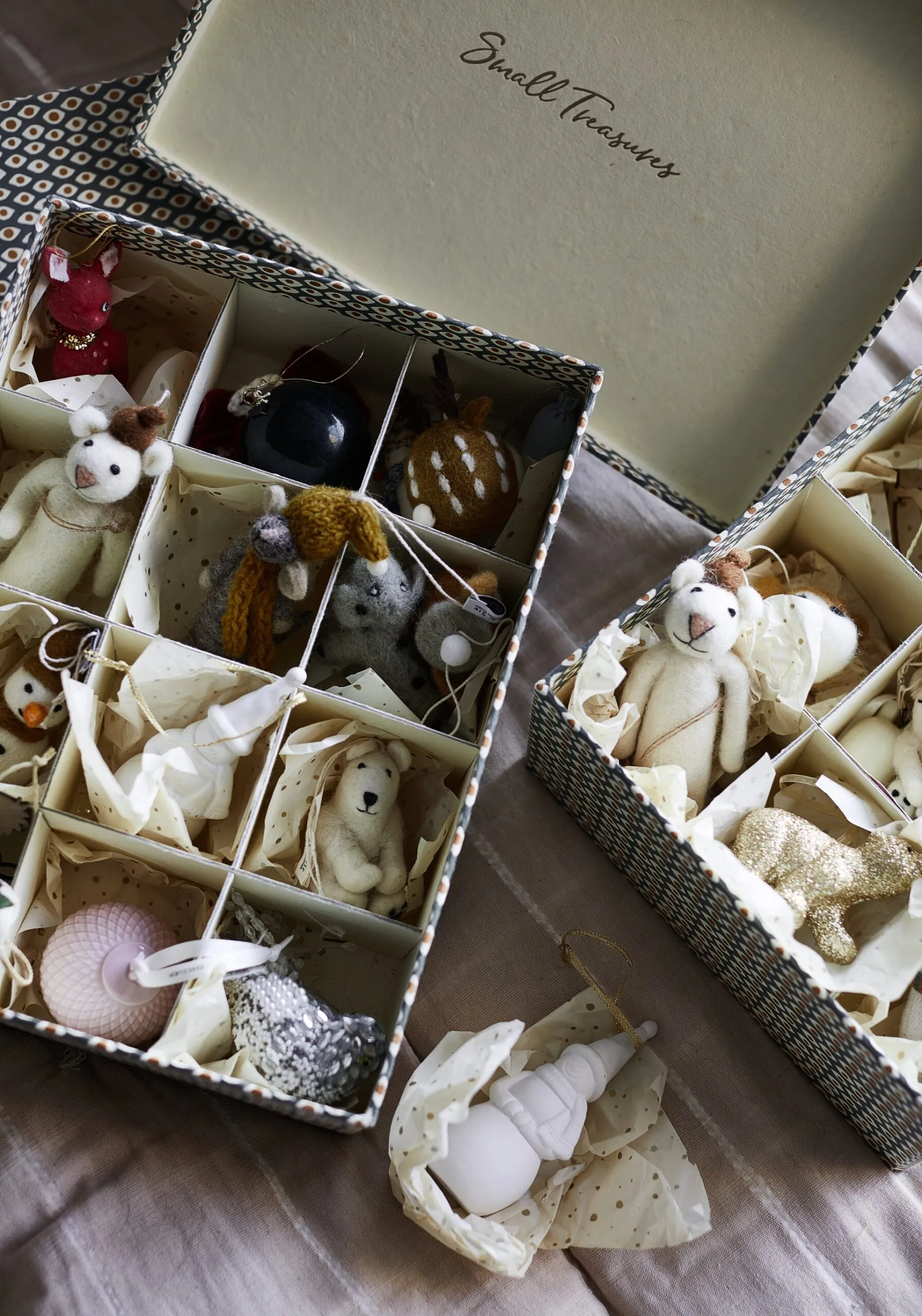 A box of felt Christmas ornaments