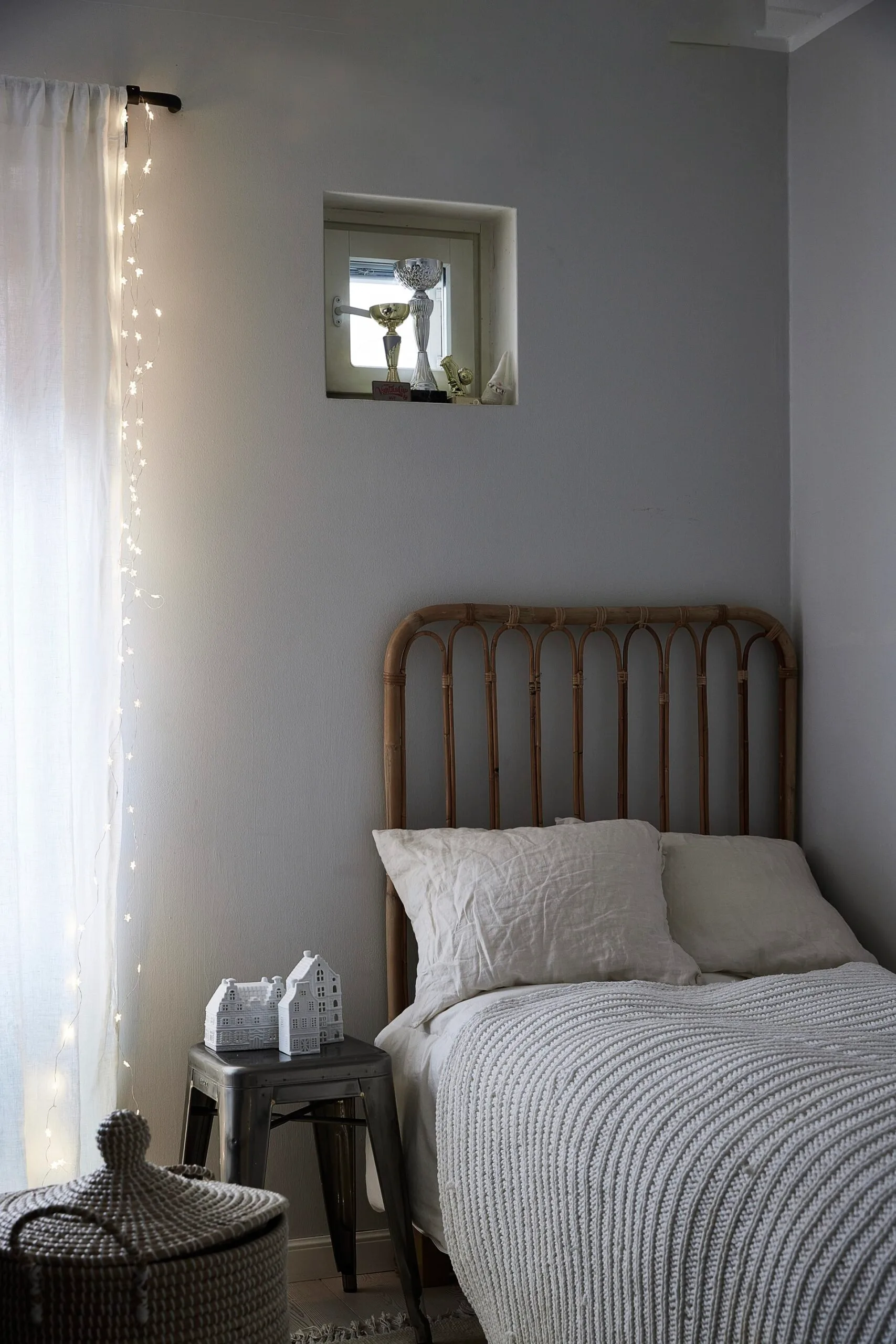 A Scandi bedroom with a single bed