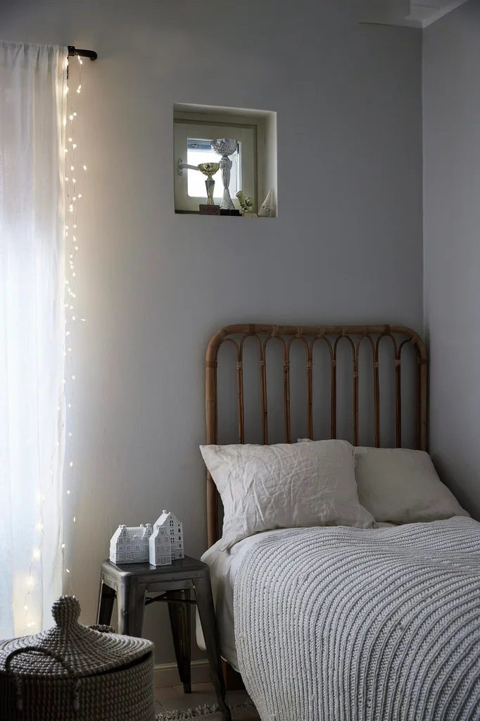 A Scandi bedroom with a single bed