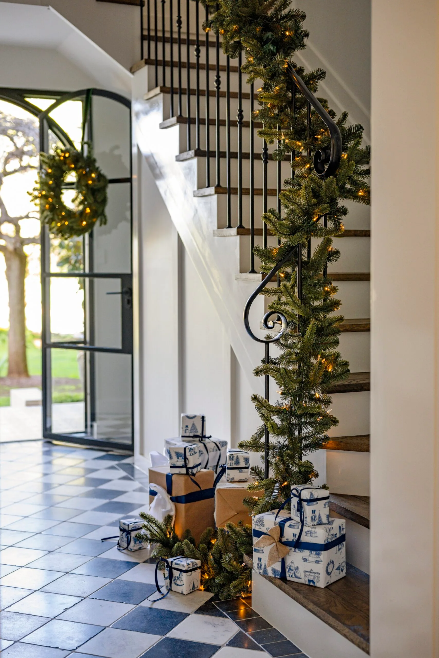 A white staircase with Christmas decorations