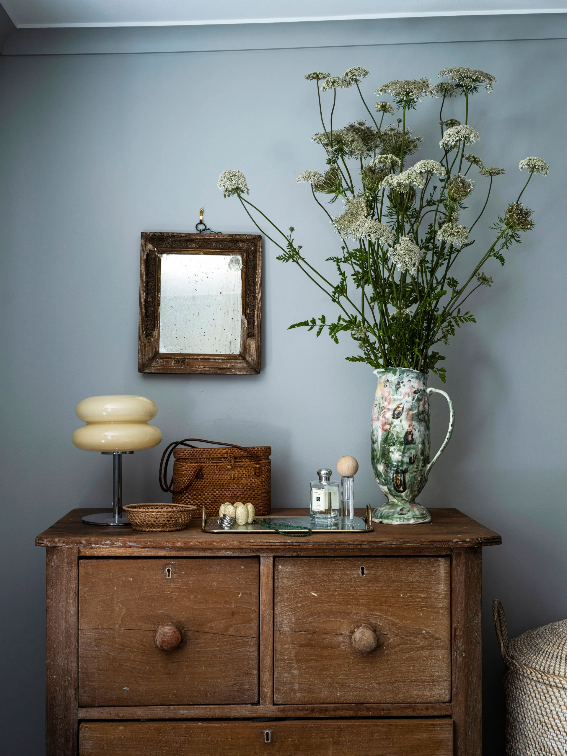 A battered chest of draws with a Gwenna Green jug
