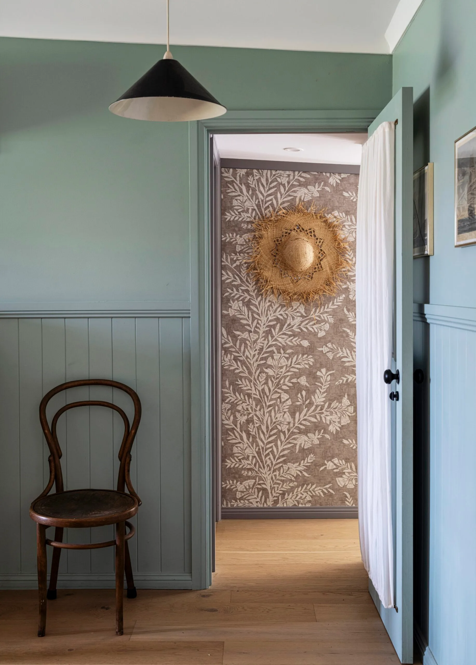 Decorative wallpaper through an entryway
