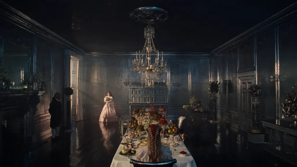 A still from the film 'Wuthering Heights' depicting a grand dining room